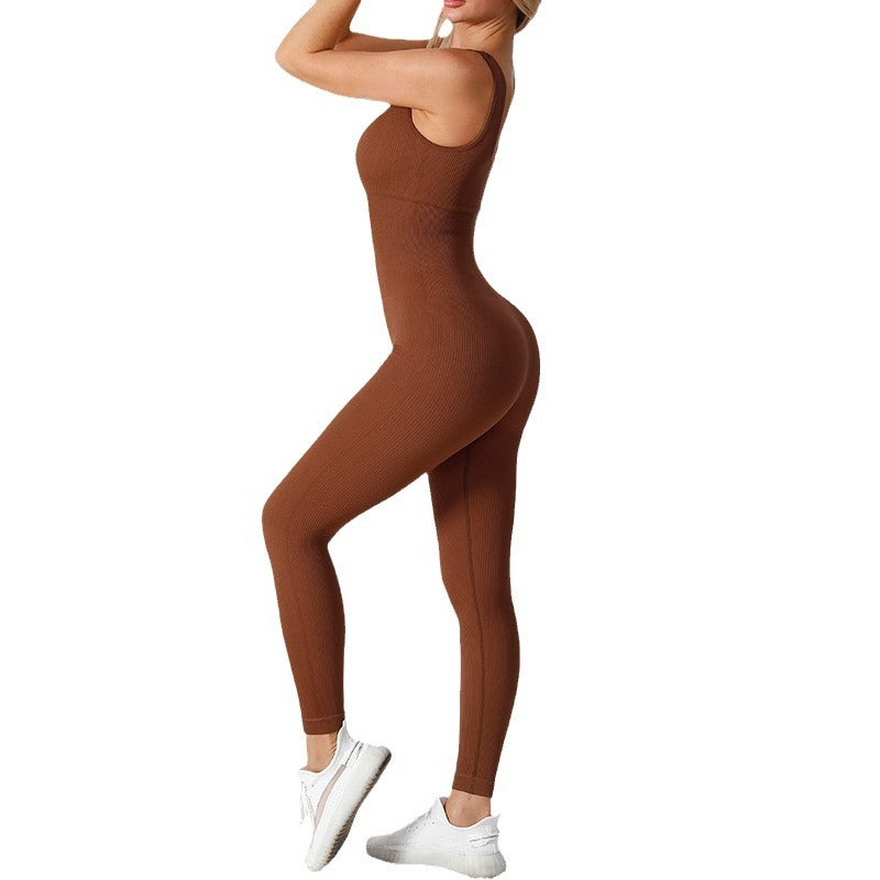 Fashion Couture seamless yoga jumpsuit, moisture-wicking activewear one-piece workout suit, form-fitting and comfortable for exercise.