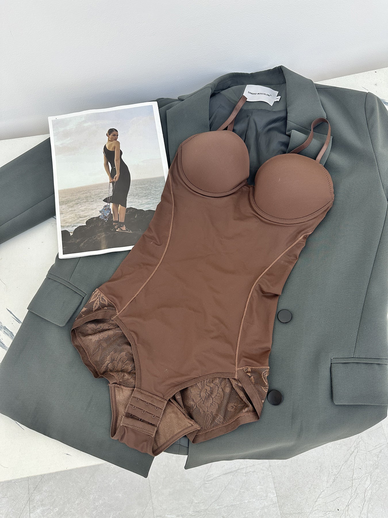 Fashion Couture seamless shapewear bodysuit with built-in bra, tummy control, and butt lift for a smooth silhouette.