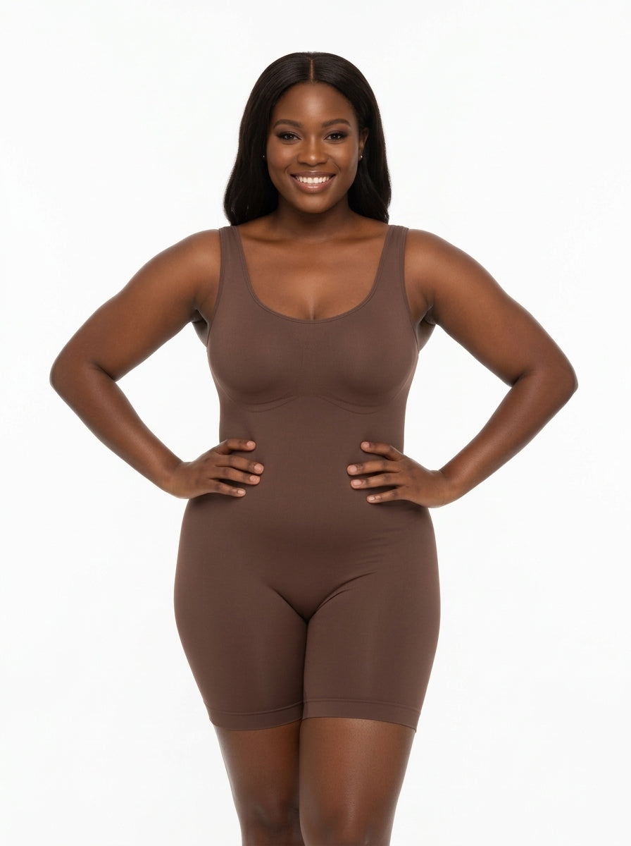 Women's Fashion Couture shapewear jumpsuit with corset-style design and butt lift feature, shown in a sleek black fabric.
