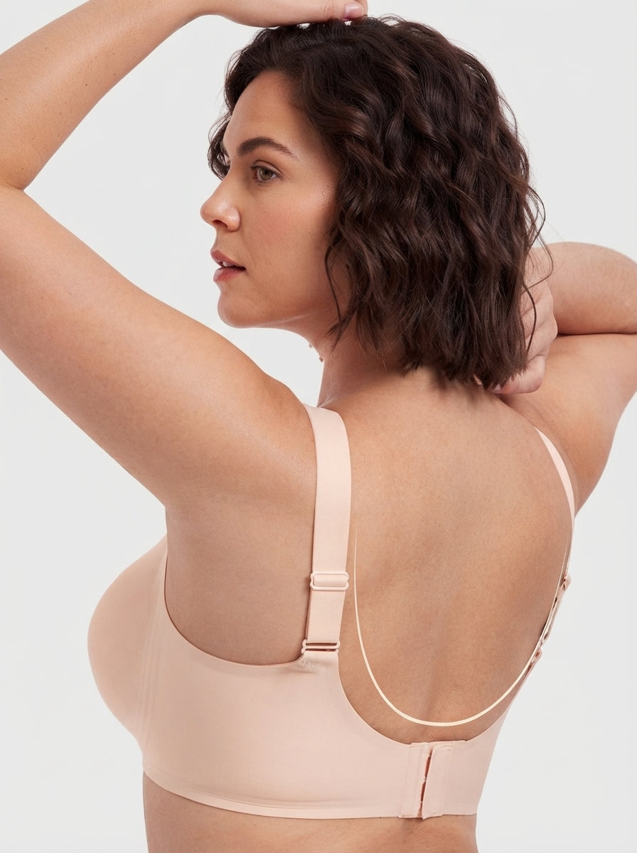 Model wearing Fashion Couture seamless wireless minimiser bra for fuller busts, showcasing smooth fit and supportive design.