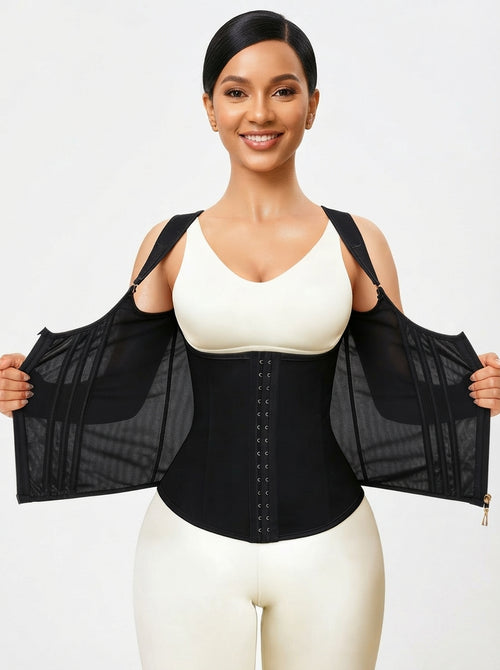 Model wearing black steel boned mesh corset by Fashion Couture, waist cinching fitness and wellness garment in size S–XXL.