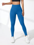 High-waist seamless yoga leggings by Fashion Couture featuring butt lifting and tummy control, shown on a model in activewear.