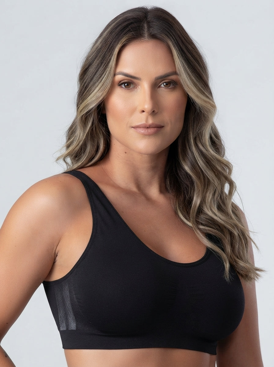 Full face of a model wearing Fashion Couture plus size shaper bra with power mesh, wide straps, seamless lift, and full figure support.