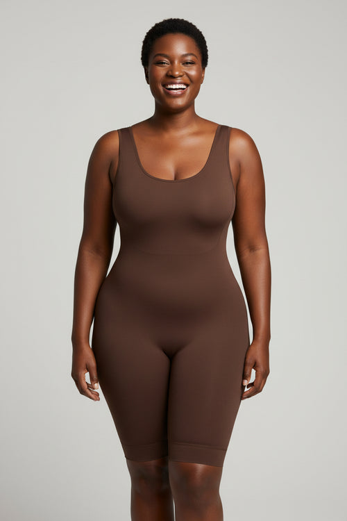 Fashion Couture body sculpting shapewear suit with abdominal support and butt lift design, shown on a mannequin.