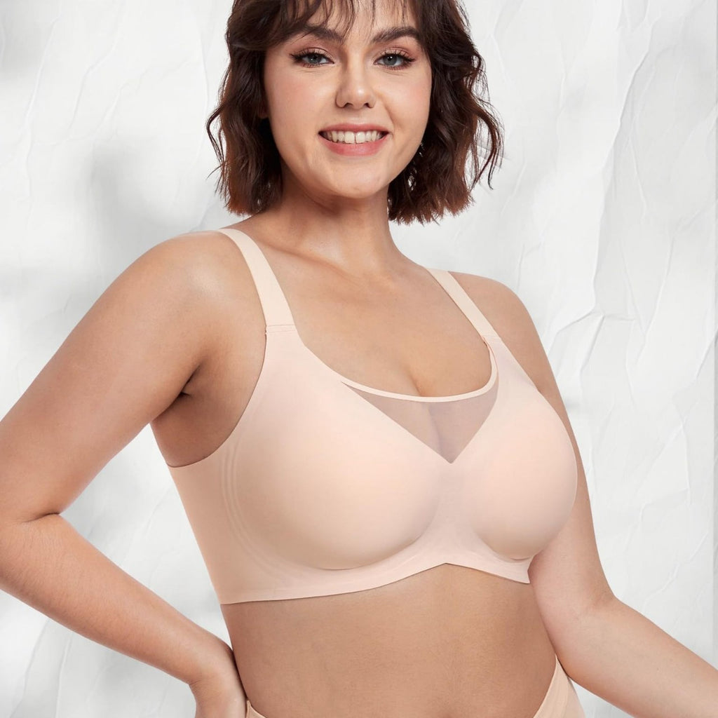 Seamless wireless minimizer bra by Fashion Couture, full bust support, smooth shapewear with all-day comfort, shown on a model.