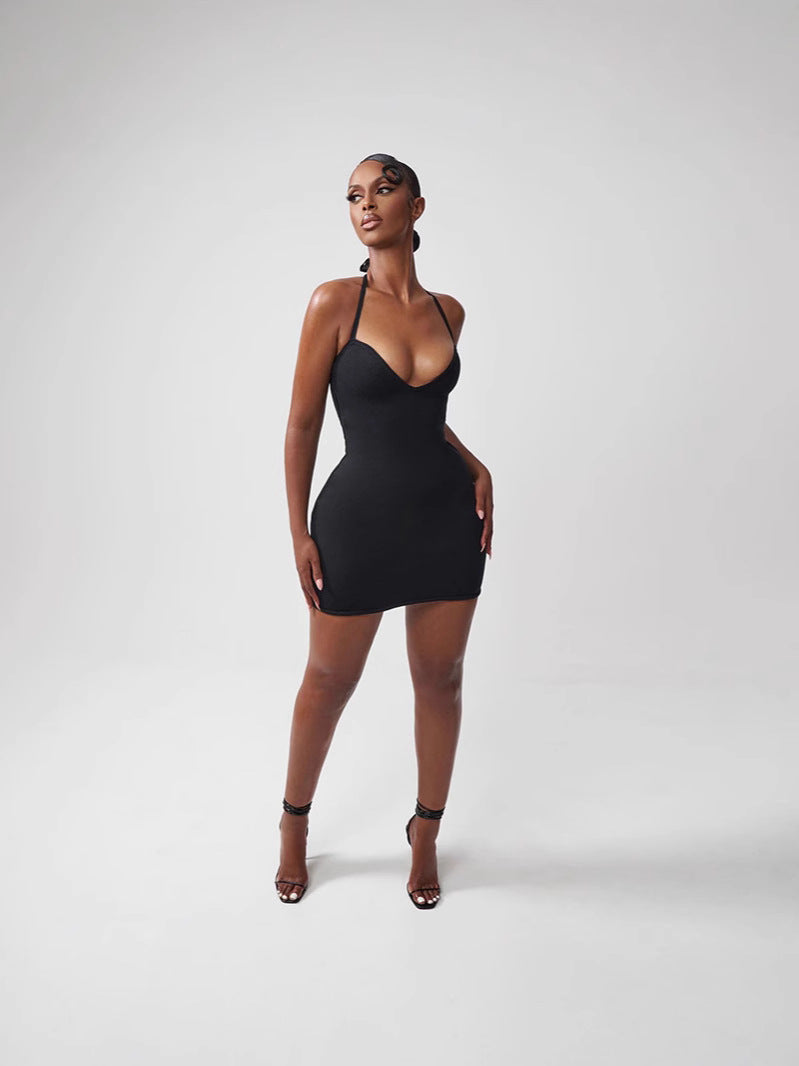 Fashion Couture sleeveless V-neck bodycon dress shown on a model, fitted silhouette with a stylish V-neckline and smooth fabric.