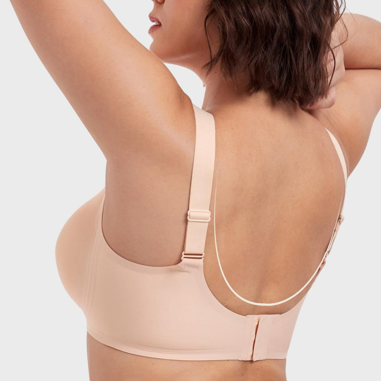 Seamless wireless minimizer bra by Fashion Couture offering full bust support and all-day comfort, shown on a model.