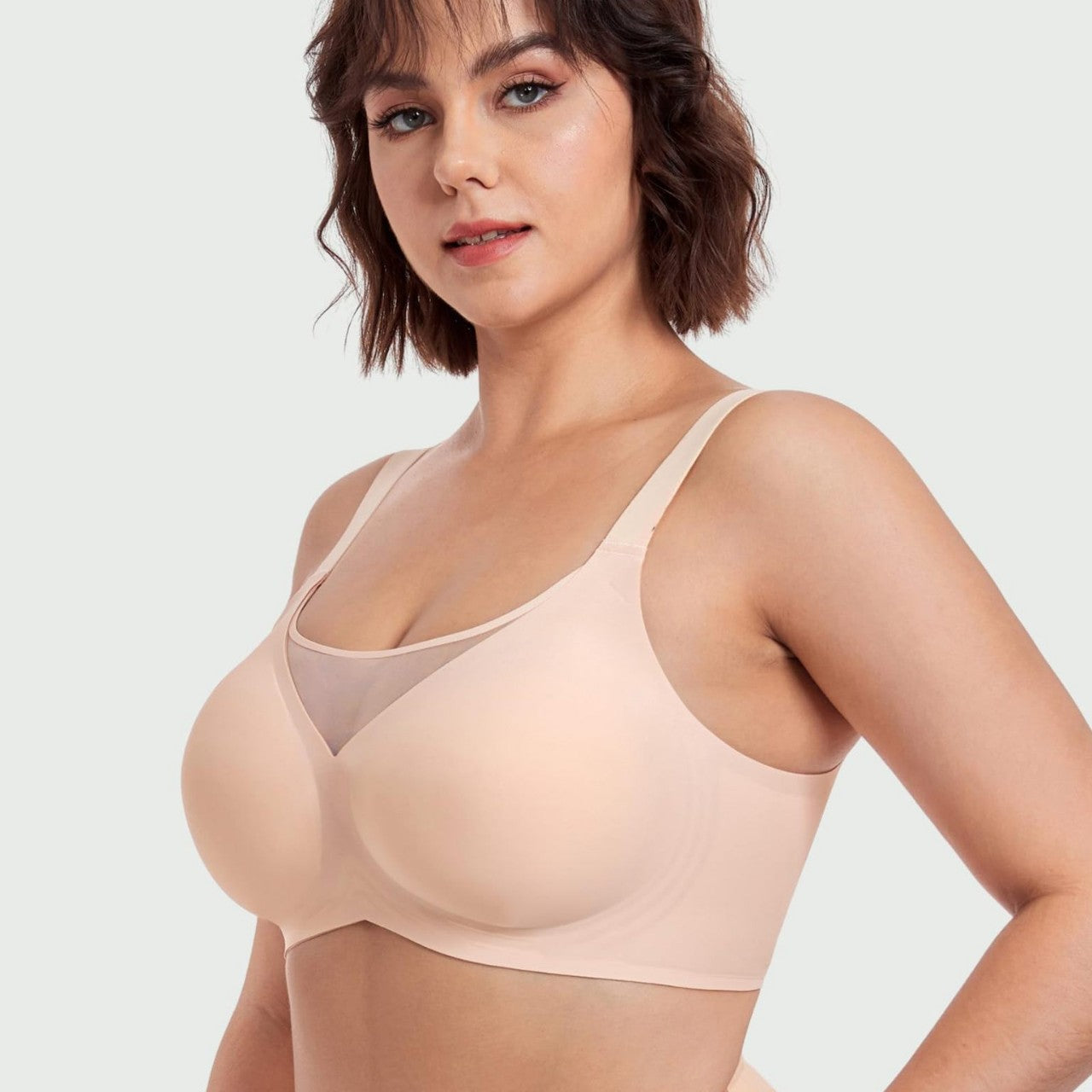 Seamless Wireless Minimizer Bra by Fashion Couture, full bust support, smooth shapewear for all-day comfort, shown on a model.